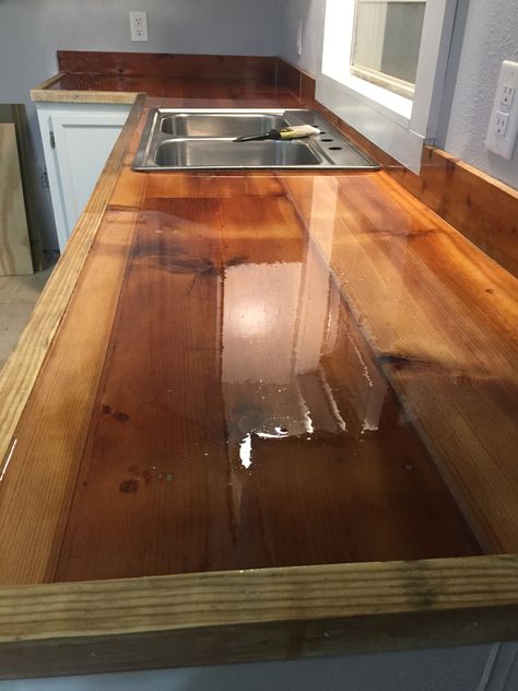 Reclaimed wood kitchen countertops, sealed with epoxy. 2x6 Wood Countertops, Epoxy Over Wood Countertop, Polyurethane Countertops, Cedar Countertop Kitchen, Epoxy Countertop Wood, Diy Wood Countertops Kitchen, Epoxy Wood Countertop, Wooden Kitchen Countertops, Wood Kitchen Countertops