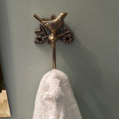 "Adding a touch of vintage whimsy with this antique bird hook 🕊️✨ #VintageCharm #AntiqueFind #HomeDecorInspo #RusticRevival #EclecticStyle #VintageVibes #TimelessTreasure #InteriorStyling #TrendingDecor #UniqueFinds" Brass Towel Hooks, Brass Towel Hook, Bird Bathroom, Brass Bird, Laundry Bathroom, Bird Motif, Brass Antique, Hanging Towels, Bathroom Accessory Set