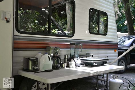 Tips for camping in a travel trailer, via Funky Junk Interiors - outdoor kitchen Rv Hack, Trailer Camping, Travel Trailer Camping, Trailer Life, Camping Rv, Camping Camper, Funky Junk Interiors, Rv Hacks, Camper Living