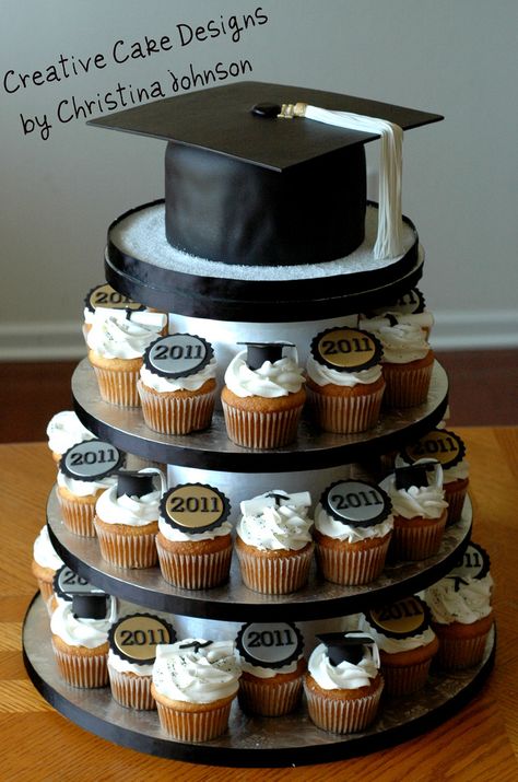 https://flic.kr/p/9QXVuY | Graduation Cupcake Tower | For Grad's from multiple schools. I went with generic colors and LOVE how it turned out! I had complete control over the entire design.  All cupcakes toppers are hand made and completely edible Grad cap on top is Cake and completely edible as well! =) Cakes Graduation, Senior Graduation Party, Graduation Open Houses, Graduation Party Planning, College Graduation Parties, Graduation Cupcakes, High School Graduation Party, Cupcake Tower, Graduation Cake