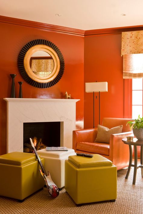 Living room, Room, Orange, Interior design, Furniture, Yellow, Property, Table, Wall, Building, Orange Interiors, Slc Interiors, Colorful Ottoman, Family Room Colors, Orange Rooms, Open Family Room, Living Room Orange, Orange Interior, Orange Decor