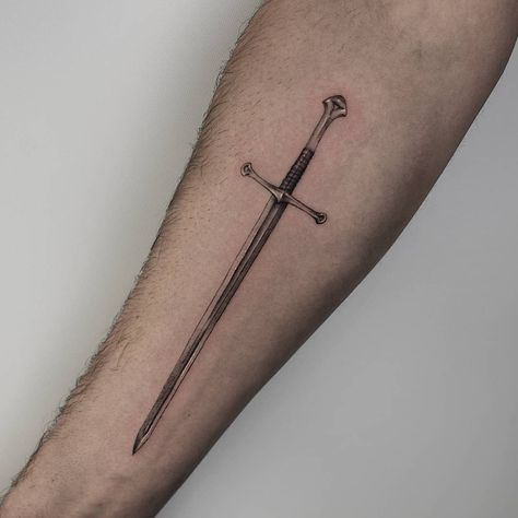 Swords Tattoo Men Forearm, Arm Tattoo Swords, Tattoo Swords Men, Tattoo Swords Men Arm, Swords Spine Tattoo, Lotr Tattoo, Inner Bicep Tattoo, Lion Tattoo Sleeves, Finger Tattoo For Women