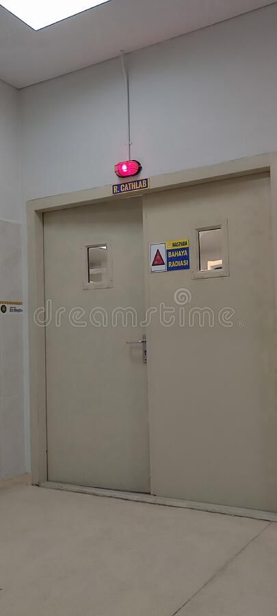 Operating room for cardiac catheterization in hospital royalty free stock photo Hand Pic, Operating Room, Girl Hand, In Hospital, Wood Shelf, Room Doors, Room Signs, Royalty Free Stock Photos, Calligraphy