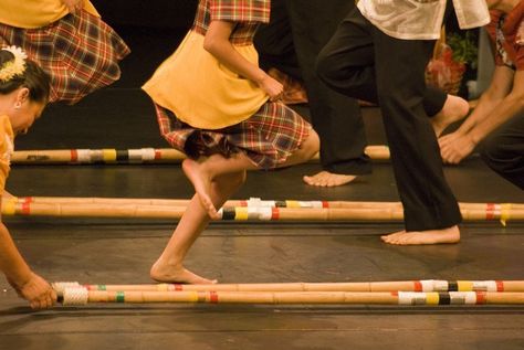 This is a more closeup look of the traditional dance, tinikling