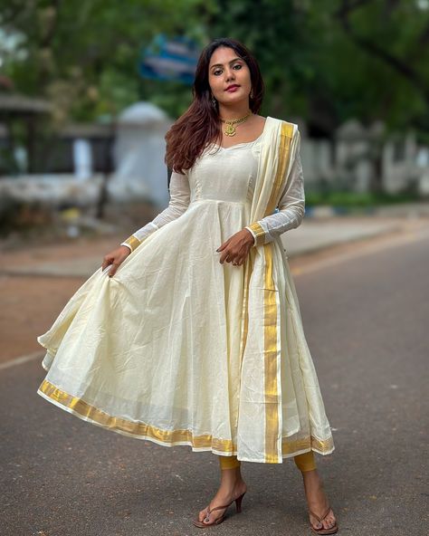 PARVATHI 🌸 || ONAM COLLECTION || CODE:LK281 Look stunning in our traditional cream and golden Onam cotton Anarkali❤️ NOTE: PANT IS NOT INCLUDED . Anarkali length: 47 inches. (Additional charges applicable for full length customisation ) #labelkamra #onlineshopping #shoponline #lehenga #cottondress #dress #dresses #longdress #traditionalwear #frock #labelkamra #ethnicwear #ethnicwearonline #madeinindia #ethnicfashion #traditionaldress #weddingcollection #nursingfriendlydress #narayanpet #... Off White Anarkali, Onam Special, Onam Outfits, White Anarkali, Diwali Dresses, Nursing Friendly Dress, Alaska Fashion, Black Lehenga, Slim Fit Mens Shirts