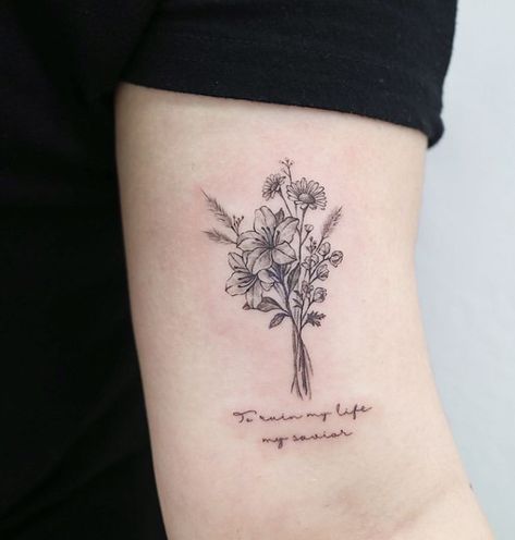 Flower Bouquet Tattoo With Words As Stem, Side Upper Arm Tattoos For Women, Flowers With Writing Tattoo, Birthday Bouquet Tattoo, Flower And Writing Tattoo, Wildflower Bouquet Tattoo Forearm, Flower Bouquet Tattoo Back, Flower Bunch Tattoos, Lily Bouquet Tattoo