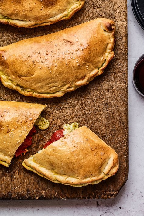 Our Best Summer Picnic Recipes is a group of recipes collected by the editors of NYT Cooking Calzones Recipe, Food References, Calzone Recipe, Work Lunches, Savory Pies, Tomato Mozzarella, Large Pizza, Slow Roast, Roasted Tomato