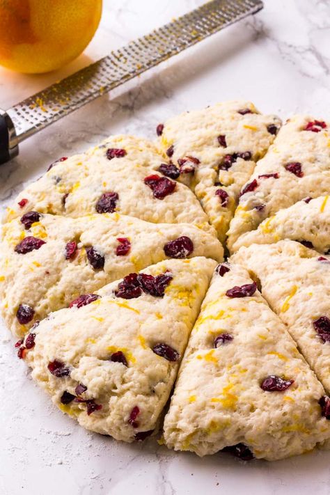 These Cranberry Orange Scones are buttery, tender and flaky with a creamy orange glaze, and they are the perfect breakfast for Christmas morning! Fresh Cranberry Orange Scones, Cranberry Orange Cream Scones, Gluten Free Orange Cranberry Scones, Christmas Scones, Scones Orange Cranberry, Orange Zest Scones, Dried Cranberries Recipes, Orange Scones Recipe, Cranberry Orange Scones