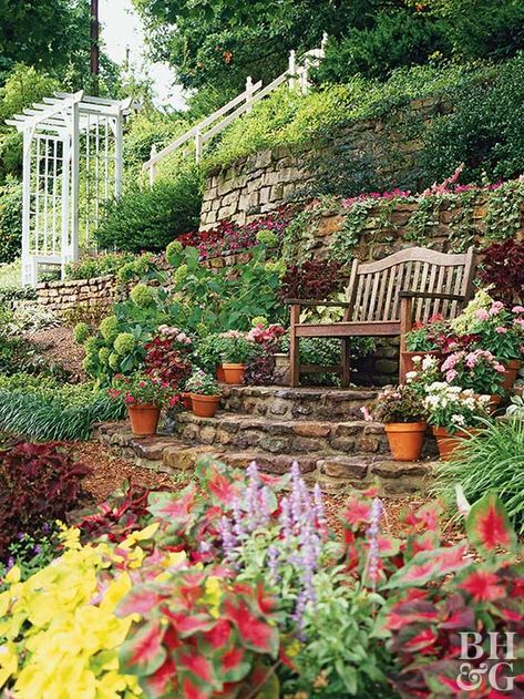 If one big wall won't do, several low walls with level terraces between may be the right solution. #landscaping #gardening #bhg Garden Problems, Sloped Yard, Hillside Garden, Sloped Backyard, Hillside Landscaping, Garden On A Hill, Garden Solutions, Sloped Garden, Meteor Garden 2018