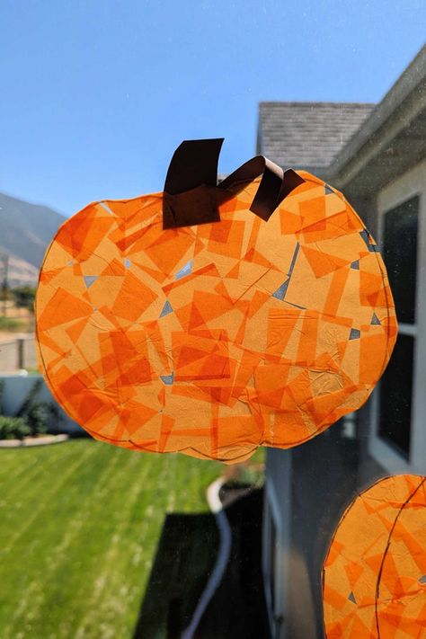 Pumpkin Art Preschool Ideas, Contact Paper Pumpkin Craft, Fall Suncatchers For Kids, Pumpkin Art Preschool, Pumpkin Suncatcher Craft, Pumpkin Crafts For Kids, Pumpkin Sun Catchers For Kids, Pumpkin Suncatcher, Pumpkin Preschool Process Art