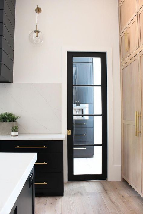 black glass pantry pocket door with steel transoms in modern kitchen #homeInterior Pantry Pocket Door, Glass Pantry, Steel Door Design, Modern Kitchen Design Black, Kitchen Black, Pocket Door, Pantry Door, Kitchen Doors, Modern Farmhouse Kitchens