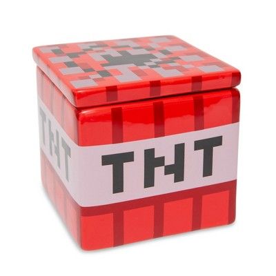 No one will mess with your goodies in this Minecraft Ceramic TNT Cookie Jar, which makes snacking a real blast. This 6" cube that looks just like the red TNT block design from the game is perfect for storing your cookies and sweets out of sight. Keep it on your desk next to your gaming rig for late night sessions. Or fill it with candy as part of the decorations at a Minecraft-themed video game birthday party. It'll blow your guests away. Minecraft Ceramics, Slab Box Ideas, Minecraft Tnt Block, Pottery Paint Ideas, Minecraft Cookies, Pinch Pot Ideas, Ap 3d Art, Dorm Needs, Minecraft Tnt