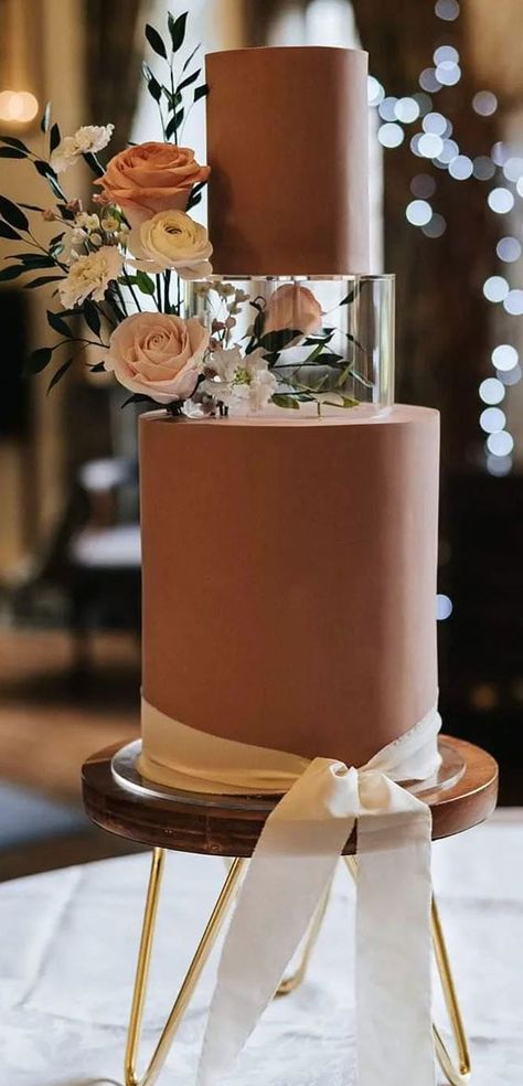 50 Beautiful Wedding Cakes in 2022 : Chocolate Wedding Cake Brown Wedding Cake Ideas, Acrylic Tier Wedding Cake, Shades Of Brown Wedding Cake, Dream Wedding Cake Unique, Wedding Cake With Acrylic Tier, Cake With Acrylic Tier, 2024 Wedding Cake, Wedding Cake Brown, Tier Cake Designs