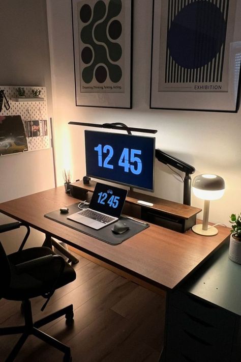 A minimal and elegant desk setup featuring a walnut desk, warm lighting, minimalistic wall art, and a small plant, creating a cozy and stylish workspace. Walnut Desk Setup, Desk Setup Aesthetic, Minimal Workspace, Minimalistic Wall Art, Bedroom Redesign, Walnut Desk, Computer Desk Setup, Personalized Desk, Aesthetic Space