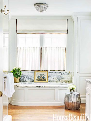 Waterworks' Boulevard fixtures complement the marble-top tub. Tub Nook, Markham Roberts, Layered Window Treatments, Bath Closet, Decorating Bathrooms, Lighting House, Future Farmhouse, Nashville House, Luxury Master Suite