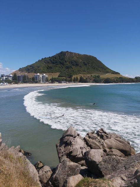 View towards Mount Maunganui from Moturiki Island, New Zealand Mount Maunganui Tattoo, Idea Tattoo, Mount Maunganui, Summer Ideas, New Zealand, Solar, Australia, Water, Quick Saves