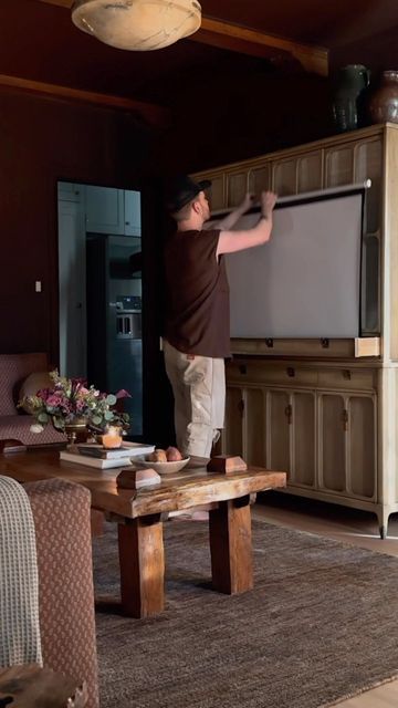 Projector Screen Living Room, Projector Screen Ideas, Projector Screen Diy, Lone Fox, Hidden Projector, Seattle Apartment, Vintage Hutch, Diy Projector, Projector Stand