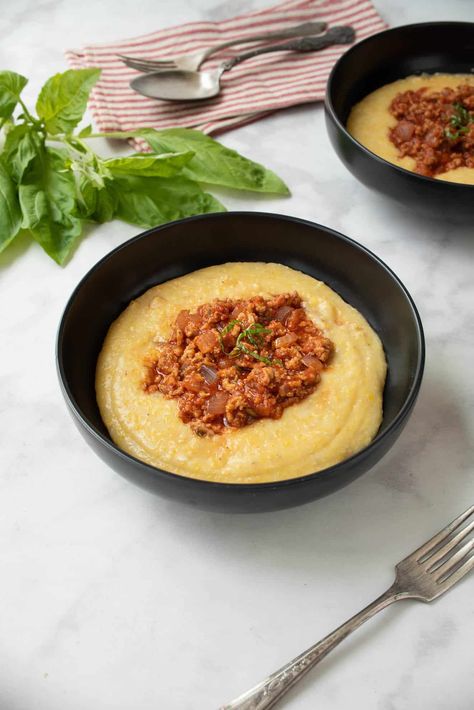 3 Cheese Polenta with Italian Sausage is a complete meal in itself. Homemade sausage tomato sauce served with creamy, cheesy polenta. #italiansausage #polenta #sausageandpolenta Polenta Dishes, Sausage Tomato Sauce, Kielbasa Sausage Recipes, Homemade Turkey Sausage, Cheesy Polenta, Cheese Polenta, Thawing Turkey, Polenta Recipes, Kielbasa Sausage