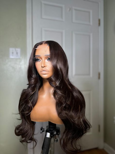 *This is a GLUELESS PREMADE UNIT* All PRE ORDERED wigs take 10-15 business days to be completed. The standard shipping time is 2-3 days. All wigs come fully customized and ready to wear with combs and adjustable straps. All premade wigs come in standard sizes that fit 20in-23.5in head sizes. Wig Specs Style: Long layers Density: 200% Length: 22” Hair type: Virgin Color: chocolate brown with beige blonde highlights Lace: hd 2x6 lace closure. (Extremely low maintenance) 2x6 Closure Wig, Brown Middle Part Wig, Beige Blonde Highlights, Middle Part Curls, Blonde Box Braids, Wavy Wigs, Beige Blonde, Natural Hair Beauty, Pretty Braided Hairstyles