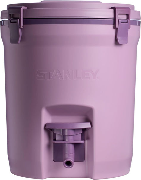 $55.00

Color	Lilac
Material	Plastic
Capacity	320 Fluid Ounces
Brand	STANLEY
Style	2 GAL
Stanley Adventure 2 Gallon Fast Flow Water Jug, Ice Water Dispenser, Insulated Beverage Cooler with Easy Pour Spigot and Latched Foam Lid
SPIGOT PERFECTED: Say goodbye to clogging jugs that are flimsy and wasteful, our 2 gallon has an ice catch that reduces clogging. The high-flow spigot also removes easily for cleaning Stanley Water Jug, Purple Kitchen Accessories, Stanley Products, Gallon Water Jug, Stanley Adventure, Camping Water, Purple Kitchen, 13 Hours, Water Containers