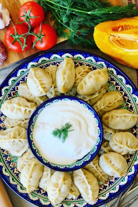 Manti Steamed Dumplings made with ground beef and pumpkin. Popular across Russia, Kazakhstan and Uzbekistan. Delicious with sour cream - Russian Manti (Манты) Russian Food Aethstetic, Soviet Recipes, Kazakhstan Food, Uzbekistan Food, Russian Dumplings, Steamed Dumplings, Russian Food, Oven Roasted Chicken, Special Diet