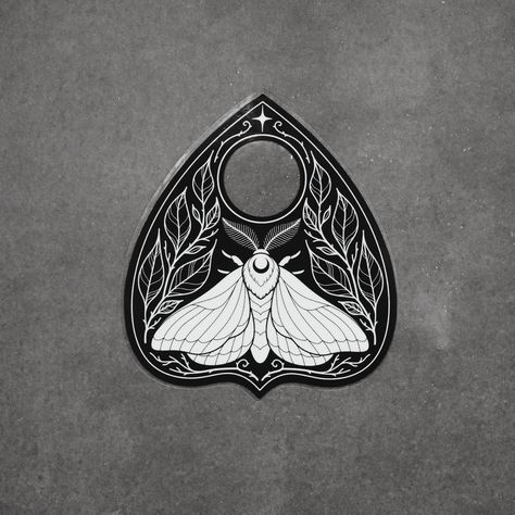 a white moth on black planchette surrounded by leaves and thorns. ✦ black and white shiny vinyl sticker ✦ transparent background! ✦ dishwasher safe and weatherproof for up to 4 years ✦ about 3.1 x 3.5 inches Bat Planchette Tattoo, Oujia Board Tattoos, Ouija Planchette Tattoo, Witch Doodles, Planchette Tattoo, Ouija Tattoo, Bunny Tracks, Moth Artwork, Sticker Transparent Background