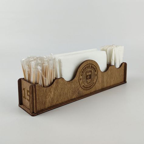 Wooden napkin holder organizer with an elegant engraving is a greeat choice for a cafe, bar, restaurant and hotel. Your logo is ar the forefront, they will be unique. They are created by engraving on plywood. It is a machine supported hand work product. Just place your order and send us the vektor drawing of your logo! Large universal condiment caddy with napkin holder and spices. We have designed special size for tall seasoning jars or glass bottles with olive oil, soy sauce, etc. placing. Also Wooden Salt And Pepper Holder, Bbq Caddy, Seasoning Jars, Wooden Napkin Holder, Condiment Caddy, Logo Coffee, Wood Napkin Holder, Wood Router, Beginner Woodworking Projects