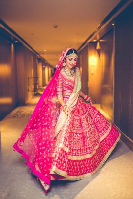 Lovely bride twirling on her wedding day in a pink bridal lehenga|WedMeGood| Gauri & Anshuman|#wedmegood #indianweddings #lehenga #bridallehenga #twirling #weddingday #pink #pinklehenga Wedding Lehngas, Wedding Lengha, Pink Bridal Lehenga, Beautiful Lehenga, Indian Wedding Lehenga, Bridesmaid Photoshoot, Indian Wedding Gowns, Designer Bridal Lehenga Choli, Latest Bridal Lehenga