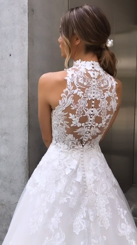 This gorgeous A-line gown features the sweetest illusion lace bodice and high neckline to complement a matching illusion lace back. Finished with covered buttons and a dreamy, flowing tulle skirt adorned with lace appliques. #bridedress Beach Bridal Dresses, Wedding Dress Guide, Wedding Dresses 2018, Wedding Dress Chiffon, Top Wedding Dresses, Dress Guide, Wedding Dress Trends, Long Wedding Dresses, Boho Stil