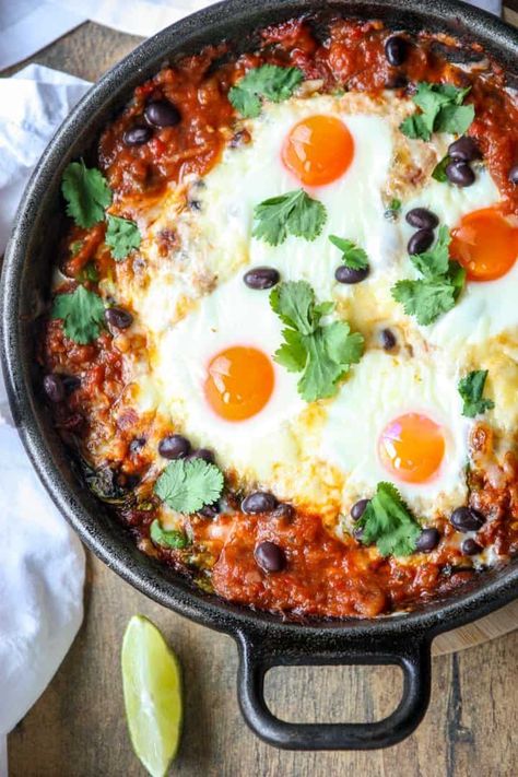 Delicious, hearty, and simple to make, this 30-minute baked huevos rancheros recipe is the perfect one-skillet breakfast meal for two. Huevos Rancheros Recipe, Egg Recipes For Dinner, Mexican Breakfast Recipes, Sweet Potato Soup, Breakfast Brunch Recipes, Iron Skillet, Mexican Dishes, Breakfast Dishes, Egg Recipes