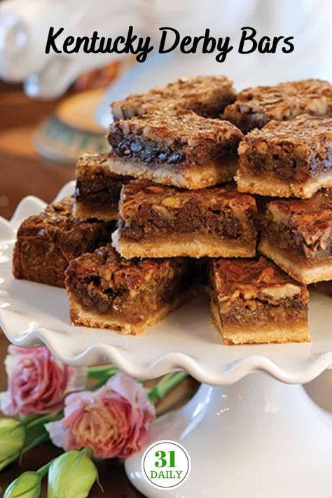 Celebrating the Derby with these simple and delicious Kentucky Derby Bars. Much like Derby Pie, these bars are packed with traditional elements like butter, eggs, pecans, and of course, chocolate. Derby Bars, Derby Pie Bars, Kentucky Derby Desserts, Derby Food, Kentucky Derby Food, Kentucky Derby Recipes, Derby Recipe, Kentucky Derby Pie, Derby Party Food