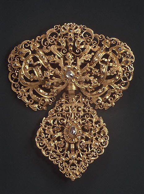 Corsage ornament Date: 18th century Culture: Portuguese Medium: Gold, diamonds Dimensions: 3-3/4 x 3 in. (9.5 x 7.6 cm) Classification: Metalwork-Jewelry Credit Line: Gift of Marguerite McBey, 1980 Accession Number: 1980.343.9 European Sculpture, Georgian Jewelry, Historical Jewellery, Ancient Jewelry, Royal Jewelry, Gold Filigree, Antique Jewellery, Vintage Jewellery, Handmade Pendants