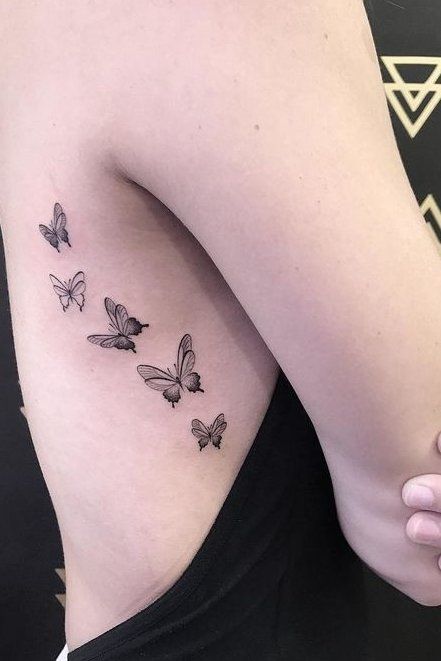 19 Captivating Rib Tattoo Ideas for Women Girl Rib Tattoos, Small Rib Tattoos, Rib Tattoos For Women, 4 Tattoo, Butterfly Tattoo Designs, Dainty Tattoos, Rib Tattoo, Little Tattoos, Simplistic Tattoos