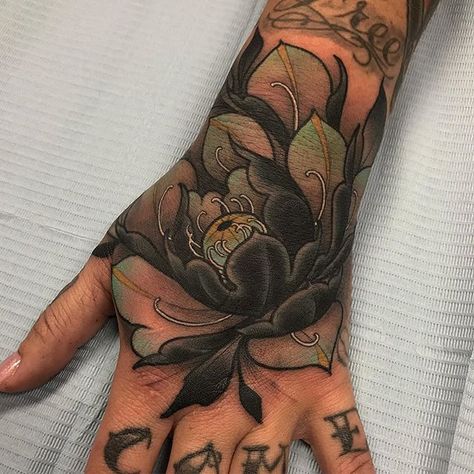 Coverup Hand Tattoos For Women, Lotus Flower On Hand Tattoo, Green Hand Tattoo, Colour Hand Tattoo, Hand Tattoos For Women Color, Flower Hand Tattoo Design, Neotrad Hand Tattoo, Lotus Throat Tattoo, Neo Trad Hand Tattoo