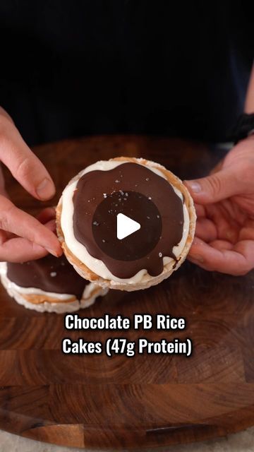 Justin Anderson on Instagram: "Chocolate Peanut Butter Rice Cakes (47g Protein Total). These taste phenomenal, super easy to make and are high protein. My new favorite protein dessert.

Ingredients:

2 plain rice cakes
2 tbsp peanut butter powder
2-3 tbsp water
1/2 tbsp peanut butter
1/2 cup plain Greek yogurt
1 scoop vanilla protein
1/2 tbsp honey
2 tbsp chocolate chips (melted)
Sea salt

-Place in fridge or freezer until the chocolate hardens 

#recipe#highprotein#dessert#proteindessert#gym#fitness#easyrecipes#weightloss#protein" High Protein Snack Recipes, Rice Cake Snacks, Protein Dessert, Butter Powder, Healthier Treats, Plain Rice, Rice Cake Recipes, Healthy Protein Snacks, Protein Cake