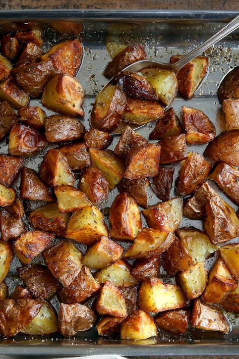 These potatoes are beloved by children and adults alike, and they are very easy to make. Just cube the potatoes (don't bother to peel) and tumble them into a pan. Pour on the olive oil, sprinkle the oregano, peel the garlic cloves (you don't even have to do that if you're pushed for time), mix everything together and stick the dish in the oven. Serve alongside some lamb chops and a simple salad, or just the salad. (Photo: Jim Wilson/The New York Times) Nyt Recipes, Panini Recipes Chicken, Nigella Lawson Recipes, Italian Roast, Roasted Potato Recipes, Simple Salad, Roast Potatoes, Nyt Cooking, Potatoes Recipe