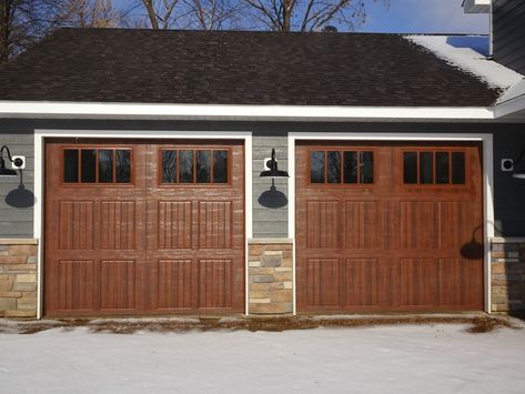 Amarr Classica in Walnut with Cortona Panels and Thames Windows.  Installed by Augusta Garage Door in St. Cloud, MN. #steelgaragedoor #dreamhome #dreamdoor #garagedoor #carriagehousegaragedoor #amarrgaragedoors #amarrclassica #carriagehousegaragedoor Walnut Garage Door, Amarr Garage Doors, Craftsman Style Windows, Wayne Dalton Garage Doors, Custom Wood Garage Doors, Carriage House Garage Doors, Garage Door Windows, Carport Plans, Steel Garage Doors