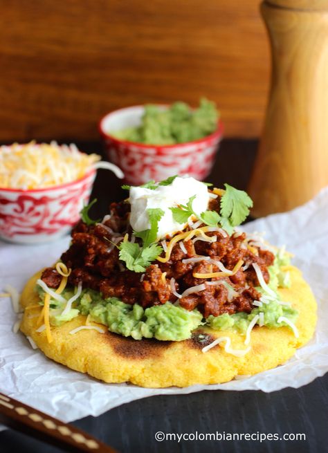 Arepas with Beef Chili, Guacamole and Cheese |mycolombianrecipes.com Pupusa Recipe, Columbian Recipes, Colombian Dishes, Arepas Recipe, Colombian Recipes, Salvadorian Food, South American Recipes, Latin American Food, Colombian Food