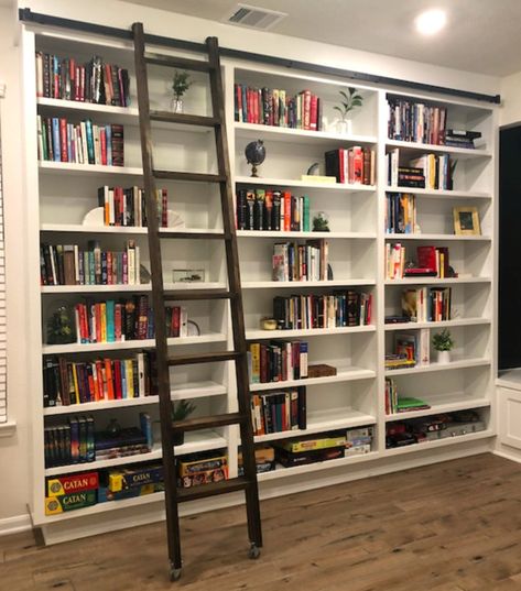 Sunroom Bookshelf, Farmhouse Library Room, Small Library Room Ideas Bookshelves, Sliding Ladder Bookshelf, Home Library With Ladder, Library Wall In Living Room, Library Room Ideas Home, Small Home Library Cozy Reading Room, Diy Glass Wall