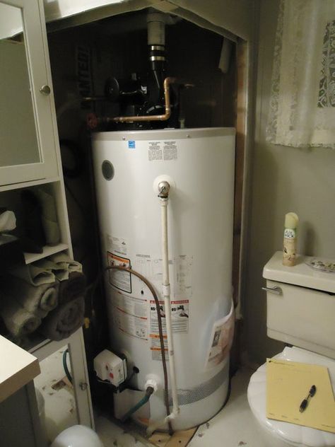 'Sliding Wall Panels' for Around Hot Water Heater : 4 Steps - Instructables Hide Water Tank, Hot Water Heater Hide, Hide Water Heater, Water Heater Closet, Water Heater Cover, Knick Knack Shelf, House Garden Ideas, Small Laundry Room Makeover, Water Heater Repair