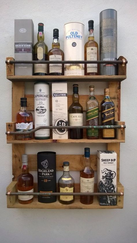 Scrap lumber + scrap pipe + copper clips = Wall bar Pallet Whiskey Rack, Liquor Shelf Diy, Hanging Liquor Shelf, Diy Liquor Shelf, Whiskey Shelf Ideas, Liquor Shelf Ideas, Nice Shelves, Masculine House, Whiskey Shelf