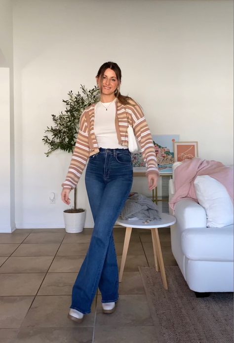 Flared Jeans Spring Outfit, Sweater Flare Jeans Outfit, White Boots Jeans Outfit, Cardigan And Flare Jeans Outfit, Cream Flare Jeans Outfit, Flared Jeans Sneakers Outfit, How To Style Blue Sweater, Sweater And Flare Jeans Outfit, Flare Bootcut Jeans Outfit