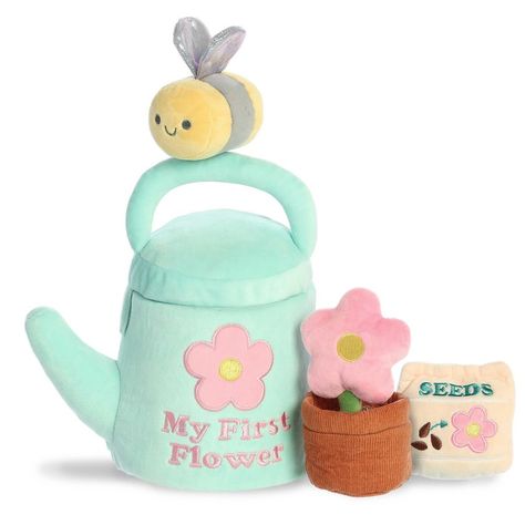 Bring the joys of the garden indoors with the My First Flower playset from Baby Talk. This interactive set invites little ones to engage in imaginative play with a plush bee, flower, and seed packet, all nestled inside a soft watering can. Designed to rattle and crinkle for sensory fun, these toys are perfect for tiny hands to hold and explore. My First Flower is not just a plaything but a tool for learning and growth, making it an excellent addition to your baby's playtime repertoire. It's the Mom Inspo, Bee Flower, Names Girl, Baby Stuffed Animals, Plush Collection, Baby Talk, Tiny Hand, Watering Can