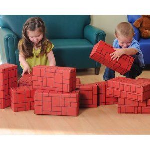 Having old shoe boxes and getting the children to color prices of paper so that it would be able to cover the shoebox would be a great idea of making giant building blocks.