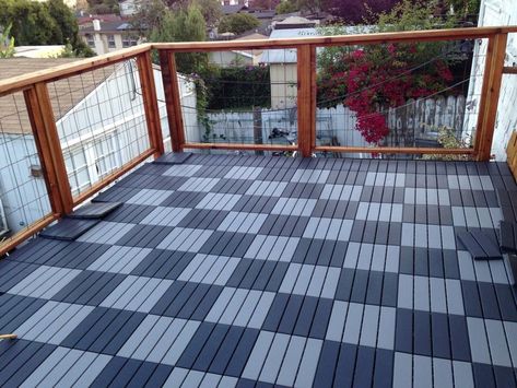 Ikea deck tiles over a flat roof deck. Compound Tiles Design, Roof Floor Tiles, Ikea Decking, Flat Roof Deck, Ikea Deck Tiles, Brick Balcony, Rooftop Tiles, Ikea Deck, Roof Patio