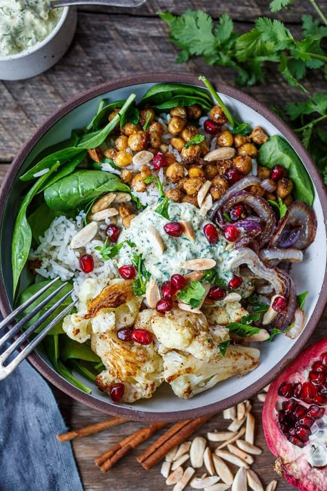 Moroccan Cauliflower Chickpea Bowls Moroccan Rice, Moroccan Cauliflower, Roasted Cauliflower Chickpea, Rice With Spinach, Chickpea Bowls, Chickpeas Benefits, Cauliflower Chickpea, Bowls Dinner, Vegetarian Dinner Recipes