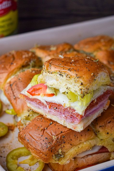 Hot Italian Sub Sliders - The Jam Jar Kitchen Hot Italian Sun Sliders, Baked Italian Sandwich, Spicy Italian Sliders, Spicy Italian Sliders Hawaiian Rolls, Oven Subs Sandwiches, Sliders And Soup, Italian Bmt Sliders, Italian Subs Sandwich Cold, Italian Sliders Hawaiian Rolls Cold