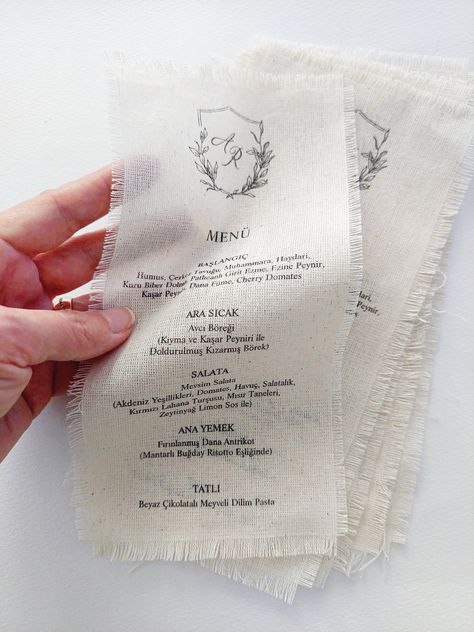 🌸Natural unprocessed Linen Menu.      Printed Fabric Menus. Use these menus if you want to wow your guests.      Fabric menu cards are textured and organic. Linen menus are designed for your special guests.      * Handcrafted     * Cotton material     * Naturel color     * Raw edges     * Hand-frayed     * High quality 🌸 Size is 4.3'' x 8.6'' (11 cm x 22 cm) - approximately.    - Additional accessories can be included for an extra fee (wax seal, cardstock backing,       vellum place cards, etc Name Card And Menu Wedding, Wedding Menu Unique, Fabric Wedding Menu, Linen Menu Wedding, Vellum Menu Wedding, Fabric Table Numbers, Wedding Menu Ideas Design, Fabric Wedding Invitations, Wedding Menu Design