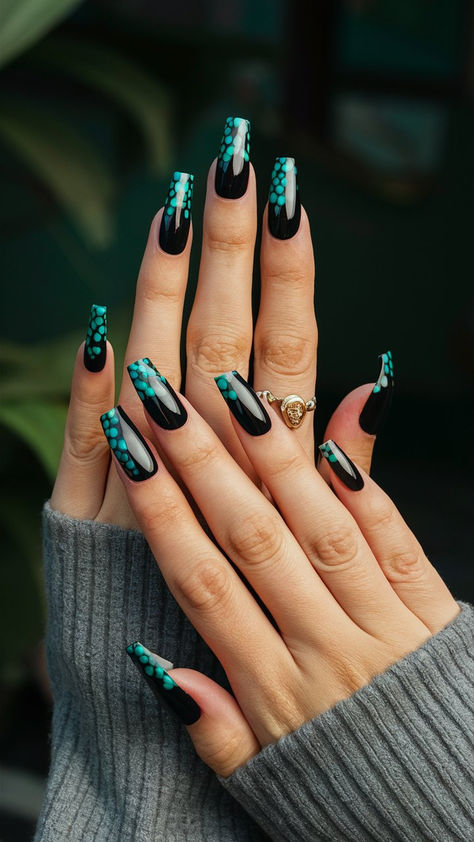 Dive into elegance with these long black nails featuring playful turquoise round elements! The deep black creates a sleek canvas, while the vibrant dots add a touch of whimsy and fun. This design strikes the perfect balance between edgy and sophisticated, making it ideal for both casual outings and special events. Try this trend to showcase your unique style and creativity—it's all about the details! 💅✨ Black Turquoise Nails, Deep Teal Nails, Nails With Turquoise, Long Black Nails, Teal Nails, Turquoise Nails, Best Nail Art Designs, Black Turquoise, Best Nail Art