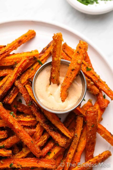 Have you ever tried carrot fries? If not, you need to! They're an easy-to-make, delicious, and healthy side dish. Seasoned to perfection, the sweetness of the carrot amplifies as the natural sugars caramelize, and the outside becomes crispy and delicious while the inside stays soft. Carrot fries are a healthy recipe that feels like a treat! #theendlessmeal #carrots #carrot #carrotfries #fries #sidedish Carrots In The Air Fryer, Carrot Fries Baked, Balanced Dinner, Butternut Squash Fries, Frozen Sweet Potato Fries, Carrot Fries, Baked Carrots, Sweet Carrot, Easy Oven